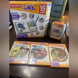 Fisher-Price iXL Learning System, storage case plus 3 games. Brand New